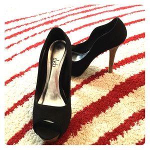 Black platform pumps with 5" cork heel