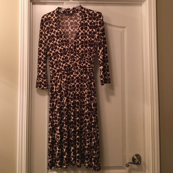 Brown "coach" style wrap dress.