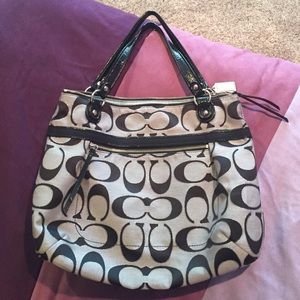 Grey, black and silver coach purse