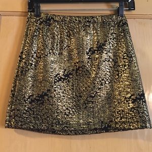 Body con gold and black metallic skirt