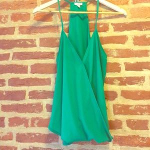 V-neck drape over sleeveless top