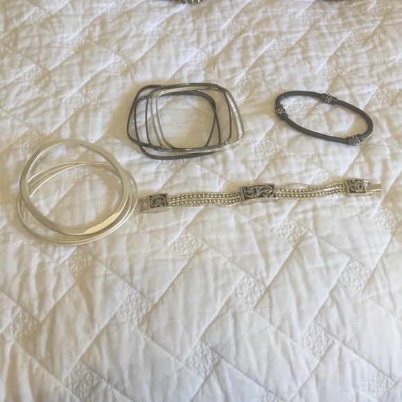 Mixed silver braclets a and bangles.