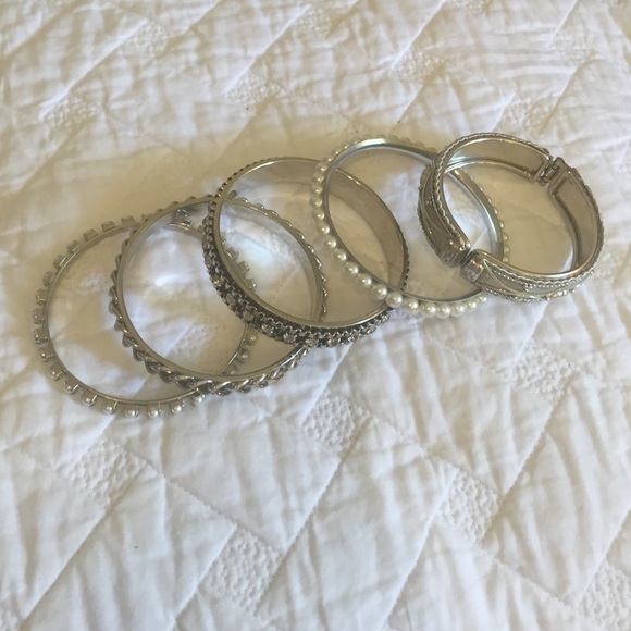 Pearl and jeweled bangles.