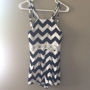 Super cute black and white romper!