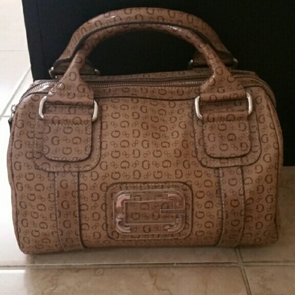 Guess stachel tan, new never used.