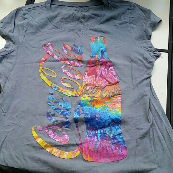 Coca-Cola tee shirt.