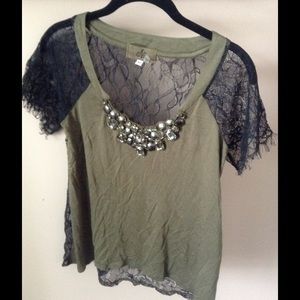 Designer top with lace and gemstones detail