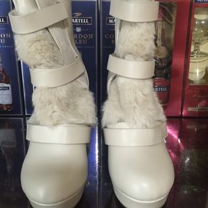 A pair of Juicy Couture boots
