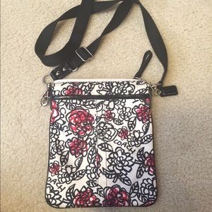 Patterned Coach cross body purse