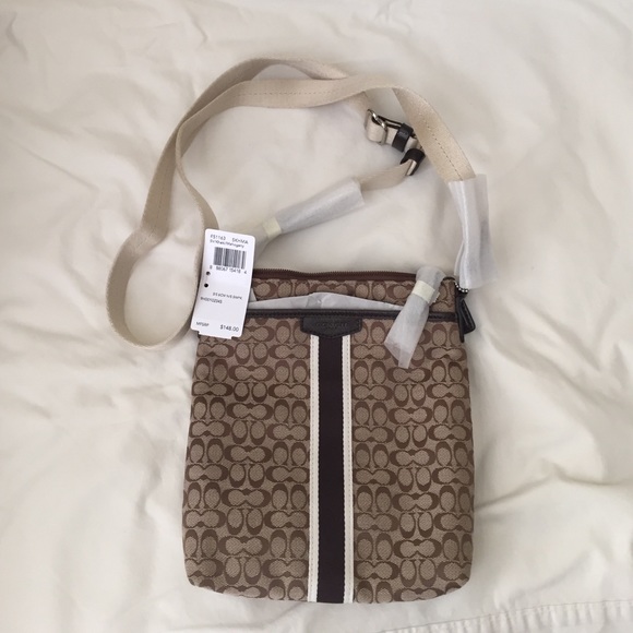 Brown Coach cross body bag