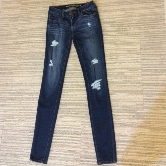 dark skinny jeans with rips