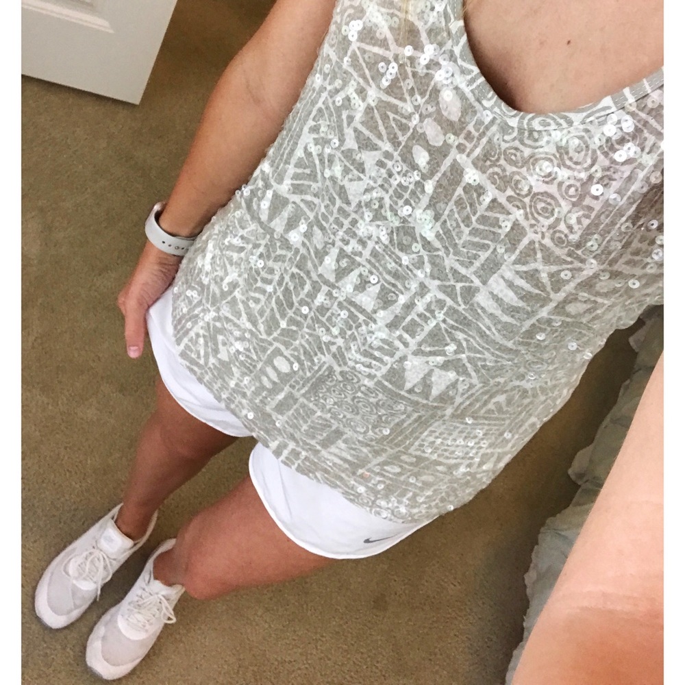 Tan and white tank
