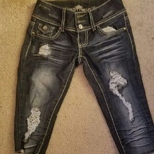 Distressed cutoff jeans
