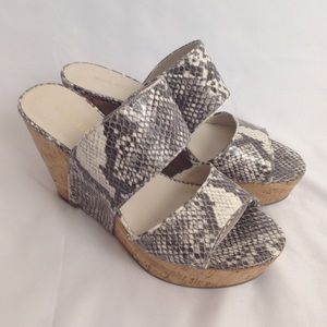 Never worn size 11 faux snake skin wedge sandal.