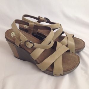 Never worn size 11 tan wedge sandal.