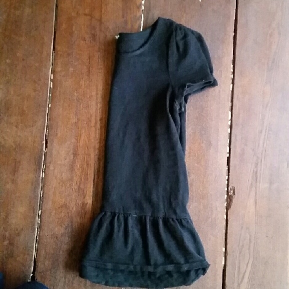 Anthropologie Black top with Peplum Detail