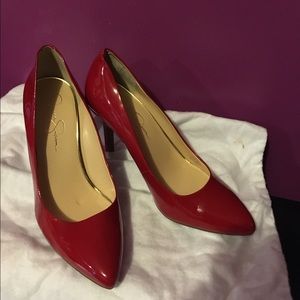 Red patent leather pumps