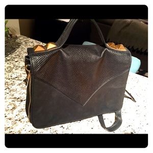 Linea Pelle black handbag
