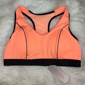 Peach padded sports bras with black trim