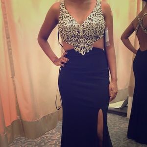 Fitting Black and Gold dress.