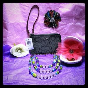 Elegant Coach Wristlet