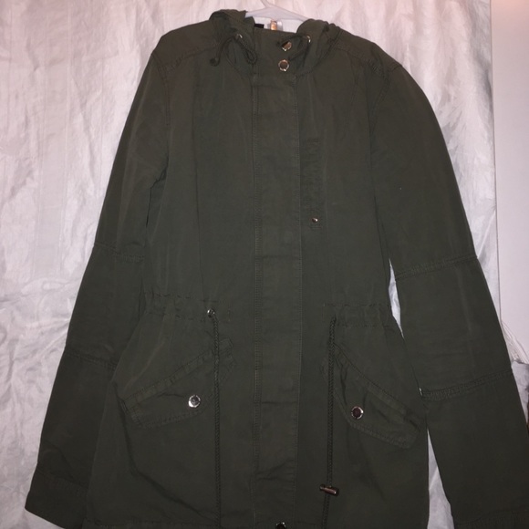 Olive green jacket.