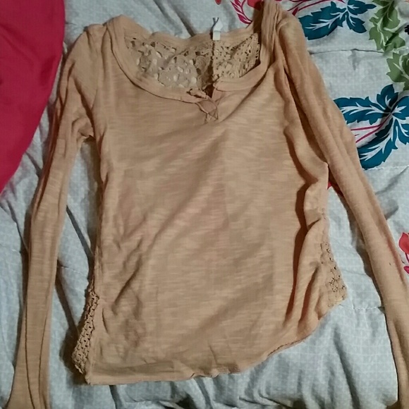 Peach colored simple long sleeve, thin shirt