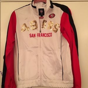 San Francisco 49ers jacket.