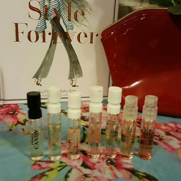 7 sample vials of perfume in a red patent bag