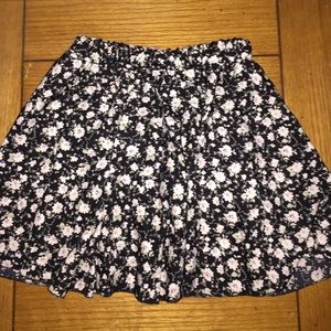 Flowered skirt.