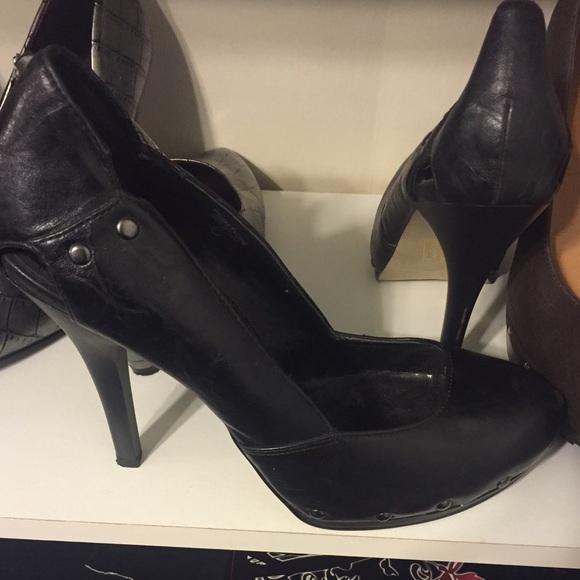Black studded pumps