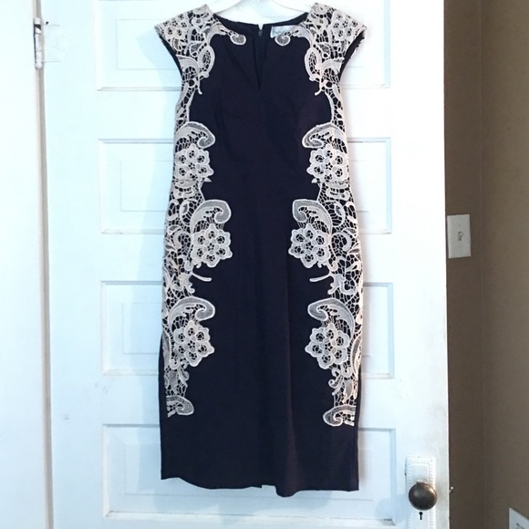 Navy blue midi length dress with cream lace detail