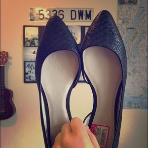 Cute, never worn, black leather Aldo flats.