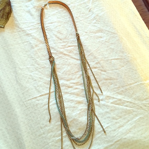 Long, gold, green and orange statement necklace