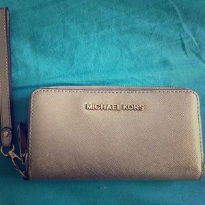Gold Michael Kors wristlet