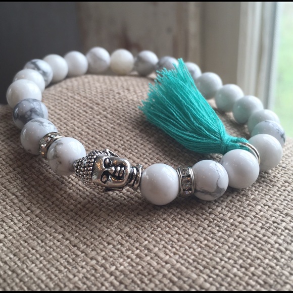 Carrera Beaded Buddha Charm Bracelet with tassel.