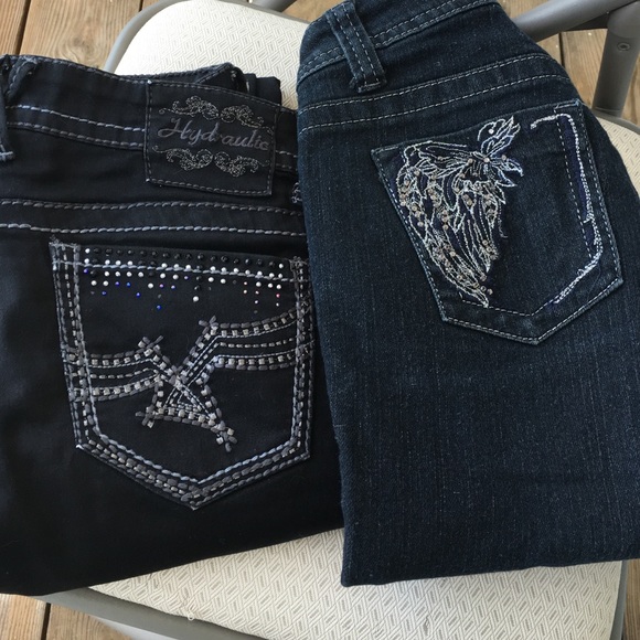 Two pair size 3/4 dark jeans.