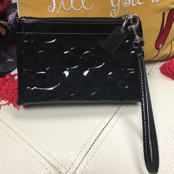 Coach wrislet wallet.