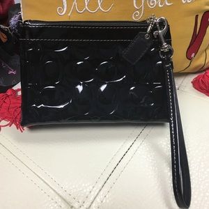 Coach wrislet wallet.