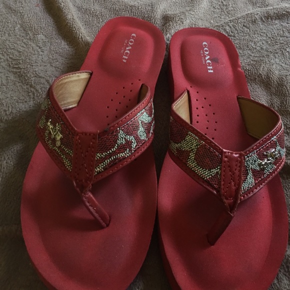 Gently used red coach logo flip flops size 7.5