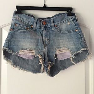 Distressed Levi Jean Shorts