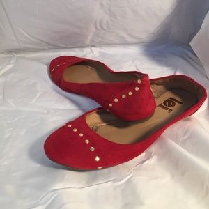 Red ballet flats with gold studs