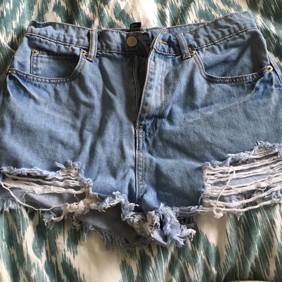 Very distressed denim shorts