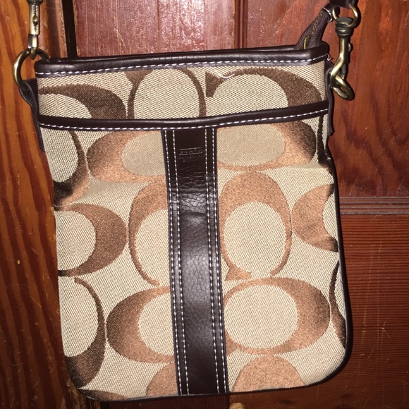 Coach cross body bag. Barely used, matches set!