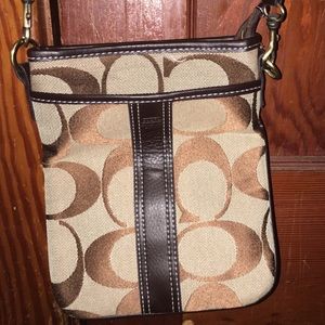 Coach cross body bag. Barely used, matches set!
