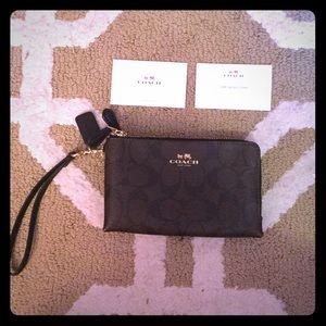 Adorable coach wristlet