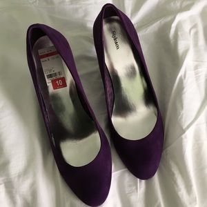 Purple suede pumps