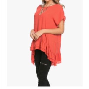 Deep coral ruffle. Hem sided top