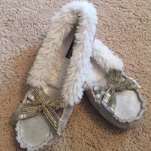 fuzzy, sparkly silver American Eagle moccasins
