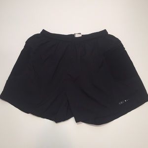 Women's REI athletic shorts with pockets